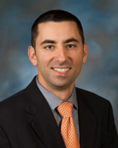 Portrait of Dr. Elio Chiarelli, Jr., Ph.D., CPFA, AIF®, BCF